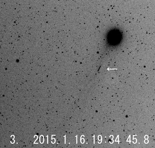 ラブジョイ彗星と人工衛星の写真